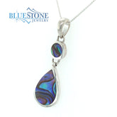 Sterling Silver Rhodium Plated Pendant Featuring One Round and One Tea